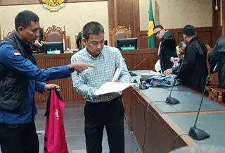 Mantan Ketua Ombudsman, Hery Susanto saat menjalani persidangan di Pengadilan Tipikor, Jakarta, Kamis (25/6/2026). (Foto: Liputan6.com/Rifqy Alief).