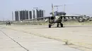 Pesawat Sukhoi Su-25 pesanan pemerintah Irak tiba di al-Muthanna, Baghdad, (1/7/2014). (REUTERS/ Stringer)