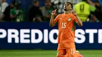 Penyerang Pantai Gading nomor punggung 15, Amad Diallo, merayakan kemenangan setelah pertandingan sepak bola Grup E Piala Dunia 2026 antara Pantai Gading dan Ekuador di Stadion Philadelphia, Philadelphia, pada 14 Juni 2026. (MAURO PIMENTEL / AFP)