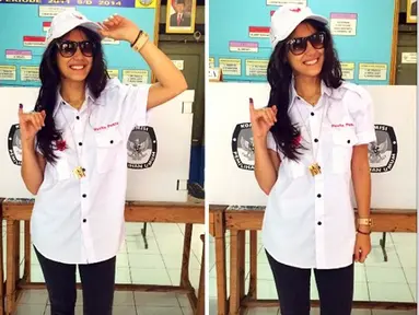 Artis cantik Pevita Pearce tampil narsis usai nyoblos dengan mengenakan kacamata dan baju putih berlambang garuda. (Instagram/ Pevpearce)