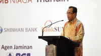 Menhub Budi Karya memberi sambutan saat menghadiri penandatanganan kerja sama antar bank sindikasi di Jakarta, Jumat (29/12). MOU tersebut merupakan bentuk kerja sama kredit sindikasi proyek kereta api ringan. (Liputan6.com/Angga Yuniar)