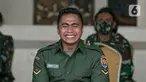 Ekspresi Aprilia Manganang setelah namanya berubah menjadi Aprilio Perkasa Manganang di Mabes AD, Jakarta, Jumat (19/3/2021). PN Tondano resmi mengabulkan permohonan pengubahan nama Aprilia Manganang menjadi Aprilio Perkasa Manganang. (Liputan6.com/Faizal Fanani)