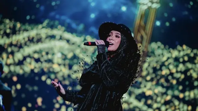 Melly Goeslaw saat Konser di Malaysia, credit: @nasikilla