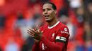 Jabatan kapten Liverpool pada musim 2023/2024 dipegang oleh Virgil van Dijk. Ia terpilih memimpin skuad asuhan Jurgen Klopp setelah Jordan Henderson hengkang ke Al-Ettifaq. Van Dijk juga merupakan kapten di Timnas Belanda. Ia resmi ditunjuk sebagai kapten De Oranje pada Maret 2018 menggantikan Arjen Robben. (AFP/Paul Ellis)