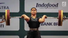 Lifter Indonesia Melinda Gusti melakukan angkatan clean and jerk pada nomor angkat besi putri 75 Kg 18th Asian Games Invitation Tournament di JiExpo, Jakarta, Senin (12/2). Melinda memperoleh emas pada nomor tersebut. (Liputan6.com/Faizal Fanani)