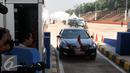 Tampak mobil yang di naiki Presiden Jokowi usai peresmian pengoperasian jalan tol Cikopo-Palimanan, Jawa Barat, Sabtu (13/6/2015). Jalan Tol sepanjang 116,754 km ini merupakan jalan tol terpanjang di Indonesia. (Liputan6.com/Johan Tallo)