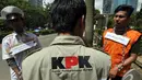 Teaterikal yang menunjukkan KPK menangkap Akil Mochtar dan penyuapnya yang lain, Jakarta, Rabu (17/12/2014). (Liputan6.com/Miftahul Hayat) 