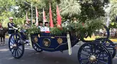 Suasana prosesi Kirab Bendera Pusaka dan Teks Proklamasi dari kawasan Monumen nasional (Monas), Jakarta, Minggu (17/8/2025). (KapanLagi.com/Budy Santoso)