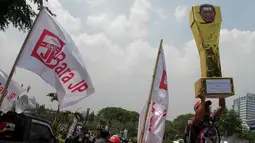 Aksi damai ini digelar terkait sikap Presiden SBY dalam undang-undang pemilihan kepala daerah, Jakarta, (30/9/14). (Liputan6.com/Faizal Fanani)
