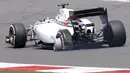 Kondisi kendaraan pembalap Formula Satu dari tim Williams, Felipe Massa, usai mengalami kecelakaan di lap pertama GP Inggris di Sirkuit Silverstone, (6/7/2014). (REUTERS/Phil Noble)