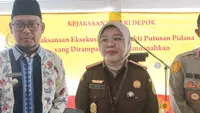 Kepala Kejari Kota Depok, Mia Banulita memberi pernyataan pers terkait dugaan korupsi pembangunan gedung Kampus UPN Veteran. (Liputan6.com/Dicky Agung Prihanto)