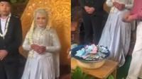 Pengantin ini pasangan wadah terbuka untuk tempat sumbangan. (Sumber: TikTok/