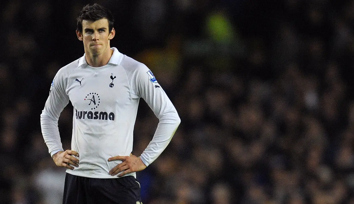 Namun, Liverpool mulai mendominasi pertandingan dan usaha mereka akhirnya membuahkan hasil pada menit ke-73. Sapuan Aaron Lennon dari tandukan Steven Gerrard menghantam kepala Gareth Bale sehingga bola masuk ke gawang tuan rumah. (AFP/Andrew Yates)
