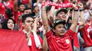 Para suporter Timnas Indonesia memberikan dukungan kepada timnya dalam laga terakhir Grup C Putaran Ketiga Kualifikasi Piala Dunia 2026 melawan Jepang di Suita Stadium, Jepang, Selasa (10/06/2025). (AFP/Paul Miller)