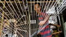 Benang-benang hasil produksi dari industri rumahan ini biasanya akan digunakan untuk berbagai macam keperluan mulai dari konveksi, pembuatan celana jeans, hingga untuk permainan layang-layang. (Liputan6.com/Angga Yuniar)