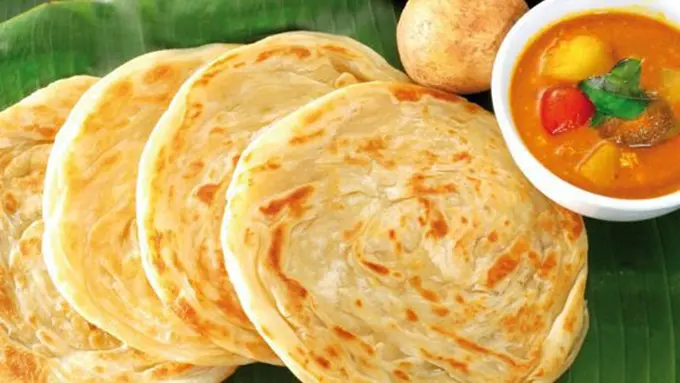 Roti canai lezat disantap bersama gulai/copyright: 21food