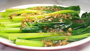 Resep Sawi Hijau Bawang Putih ala Resto Hong Kong. Foto: Gemini