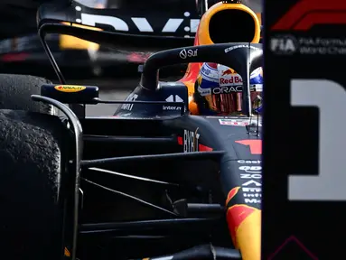 Pembalap Red Bull Racing, Max Verstappen memenangkan balapan Formula 1 GP Italia 2023 yang berlangsung di Sirkuit Monza, Italia, Minggu (03/09/2023). Verstappen sukses mencatatkan waktu 1:13:41.143. (AFP/Ben Stansall)