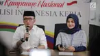 Direktur Konten TKN Jokowi-Ma'ruf Amin, Fiki Satari (kiri) memberikan keterangan terkait OTT KPK terhadap Ketum PPP Romahurmuziy, Jakarta, Jumat (15/3). Menurut Fiki, kasus Romahurmuziy adalah murni kasus pribadi. (Liputan6.com/Faizal Fanani)