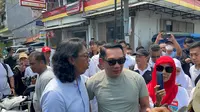 Bacagub Jakarta Ridwan Kamil blusukan ke posko makan gratis di Warakas, Tanjung Priok, Jakarta Utara. (Liputan6.com/Winda Nelfira)