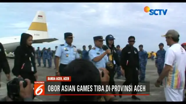 Kirab obor Asian Games 2018 telah tiba di Banda Aceh. Api singgah di Museum Tsunami dan Masjid Baiturrahman.