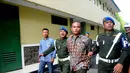 Tak hanya dipecat dengan tidak hormat dari satuannya, Pratu Heri juga akan diadili di Pengadilan Militer, Jakarta, Senin (7/7/14). (Liputan6.com/Herman Zakharia)