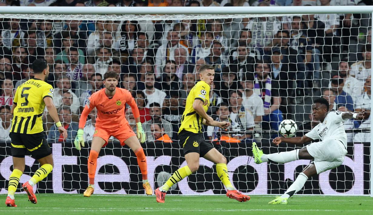 Pemain asal Brasil itu memborong tiga dari lima gol Real Madrid. (AFP/Thomas Coex)