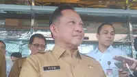 Menteri Dalam Negeri (Mendagri) Tito Karnavian di Kementerian Koordinator Bidang Perekonomian, Jakarta Pusat, Senin (29/1/2024). (Sulaeman/Merdeka.com)