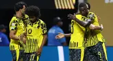 Penyerang Borussia Dortmund (Jerman) asal Guinea Serhou Guirassy (kanan) merayakan gol kedua bersama rekan setimnya selama pertandingan babak 16 besar Piala Dunia Antarklub melawan Monterrey (Meksiko) di Stadion Mercedes-Benz, Atlanta, Amerika Serikat pada 1 Juli 2025 waktu setempat atau Rabu (2/7/2025) pagi WIB. (CHARLY TRIBALLEAU/AFP)