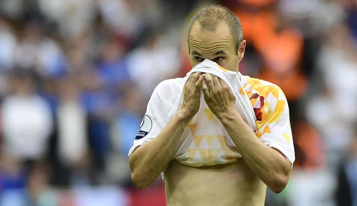 Gelandang Timnas Spanyol, Andres Iniesta yang telah pensiun dari timnas pada 1 Juli 2018 tercatat memiliki total 131 caps bersama La Furia Roja dengan torehan 14 gol. Namun tak satupun gol dicetaknya dalam 3 edisi Euro yang diikutinya pada 2008, 2012 dan 2016. Dari total 16 laga, ia hanya menorehkan 5 assist. (AFP/Pierre-Philippe Marcou)