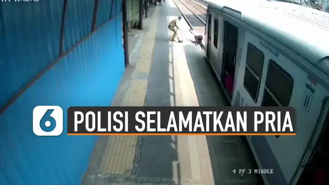 Terekam kamera CCTV aksi heroik polisi selamatkan pria yang hampir tertabrak kereta.