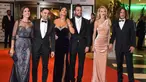 Mantan pemian Barcelona Xavi Hernandez, Cesc Fabregas dan Carles Puyol beserta istrinya saat menghadiri pernikahan Lionel Messi di Rosario, Argentina (30/6). Acara ini dihadiri banyak pesepak bola dan selebriti terkenal dunia. (AFP Photo/Eitan Abramovich)