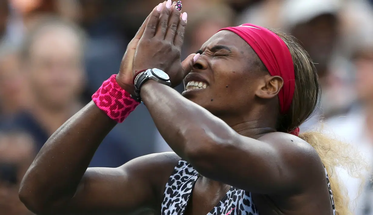 Ekspresi Serena Williams setelah memenangi AS Terbuka 2014 dengan mengalahkan Caroline Wozniacki. (AP Photo/Mike Groll)