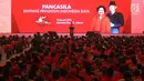 Presiden Joko Widodo saat memberikan sambutan pada HUT PDIP ke -45 di Jakarta Convention Center, Rabu (10/1). Dalam sambutanya Jokowi menyebutkan tetap menjaga Pancasila. (Liputan6.com/Angga yuniar)