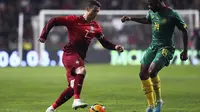 Ronaldo beraksi untuk timnas Portugal (PEDRO NUNES / AFP)