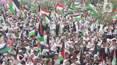 Peserta mengikuti aksi damai Depok untuk Palestina di GDC, Depok, Jawa Barat, Minggu (26/11/2023). (merdeka.com/Arie Basuki)