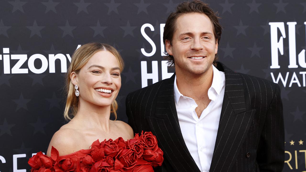 Margot Robbie dan Tom Ackerley