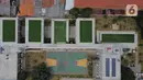 Foto udara memperlihatkan bangunan SDN Ragunan 08 yang termasuk sekolah berkonsep net zero carbon di Jakarta, Kamis (29/9/2022). Sekolah ini direhab total menjadi Sekolah Negeri Net Zero oleh Dinas Pendidikan DKI Jakarta dengan anggaran Rp.33 miliar dari APBD DKI. (Liputan6.com/Herman Zakharia)