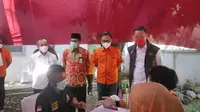 Mensos Juliari P Batubara saat menghadiri kegiatan penyaluran bansos di Kantor Pos Kecamatan Taman, Kabupaten Pemalang, Jawa Tengah, Jumat, 20 November 2020.