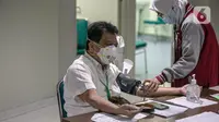 Melihat Lagi Perpres Sanksi bagi Warga yang Menolak Vaksinasi