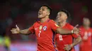 Striker Arsenal, Alexis Sanchez, menyumbang 2 gol saat Cile melumat Uruguay, 3-1, pada laga Kualifikasi Piala Dunia 2018 zona CONMEBOL di Stadion Nasional Julio Martinez Pradanos, Santiago, Rabu (16/11/2016) pagi WIB. (AFP/Martin Bernetti)