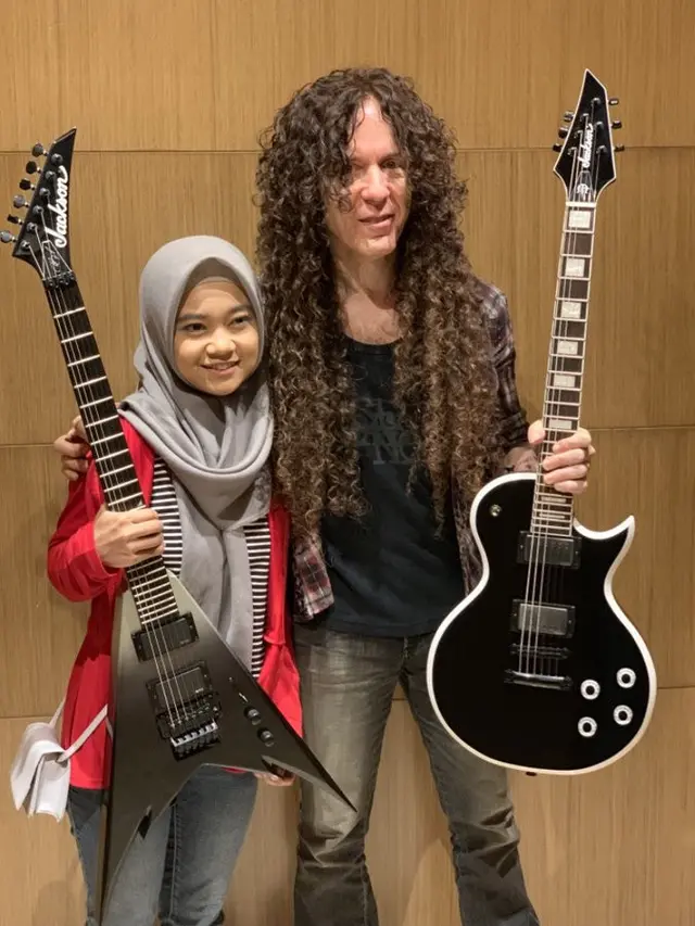 4 Fakta Sosok Gitaris Metal Hijaber yang Dipuji Marty Friedman 'Megadeth'
