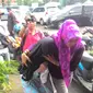 Penculik Salwa dan Salma saat digiring ke ruang penyidikan (Liputan6.com/Achmad Sudarno)