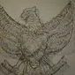 Lambang burung garuda terlihat di Pameran seni rupa nusantara 2015 di Galeri Nasional, Jakarta, Kamis (28/05/2015). Sebanyak 106 karya 2 dan 3 dimensional diantaranya lukisan, drawing, object, seni grafis, video art,dll. (Liputan6.com/Andrian M Tunay)