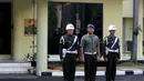 Pratu Heri (tengah) menghadiri upacara pemecatan dirinya di Markas Pusat Polisi Militer (Puspom), Jakarta, Senin (7/7/14). (Liputan6.com/Herman Zakharia)