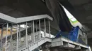 Suasana pemasangan eskalator di Halte Transjakarta di Cipulir, Jakarta, Minggu (16/4). Halte yang memiliki ketinggian sekitar 20 meter tersebut merupakan salah satu halte koridor XIII Ciledug-Tendean. (Liputan6.com/Helmi Afandi)