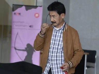 Bupati Solok Selatan Muzni Zakaria akan menjalani pemeriksaan oleh penyidik di Gedung KPK, Jakarta, Kamis (30/1/2020). Muzni Zakaria diperiksa sebagai tersangka terkait kasus dugaan suap proyek pembangunan infrastruktur Jembatan Ambayan dan Masjid Agung di Solok Selatan. (merdeka.com/Dwi Narwoko)