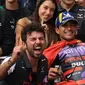 Selebrasi pembalap Ducati asal Spanyol, Jorge Martin bersama timnya merayakan keberhasilan menjuarai balapan utama MotoGP Portugal 2024 di Sirkuit Internasional Algarve, Portimao, Portugal, Minggu (24/3/2024) malam WIB. (AFP/Patricia De Melo Moreira)