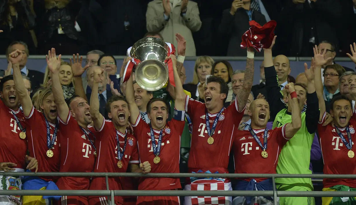 Bayern Munchen (5 kali juara) - Bayern Munchen tercatat pernah berhasil menjadi juara 3 kali berturut di Liga Champions pada tahun 1974-76. Tahun juara: 1974, 1975, 1976, 2001, 2013. (AFP/Adrian Dennis)