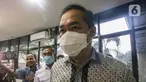 Mantan Menteri Perdagangan (Mendag) Muhammad Lutfi tiba memenuhi panggilan pemeriksaan di Gedung Bundar Kejaksaan Agung (Kejagung), Jakarta Selatan, Rabu (22/6/2022). Muhammad Lutfi diperiksa terkait kasus mafia minyak goreng, dalam hal ini perkara dugaan tindak pidana korupsi pemberian fasilitas ekspor Crude Palm Oil (CPO) dan turunannya pada Januari 2021 sampai dengan Maret 2022. (Liputan6.com/Faizal Fanani)